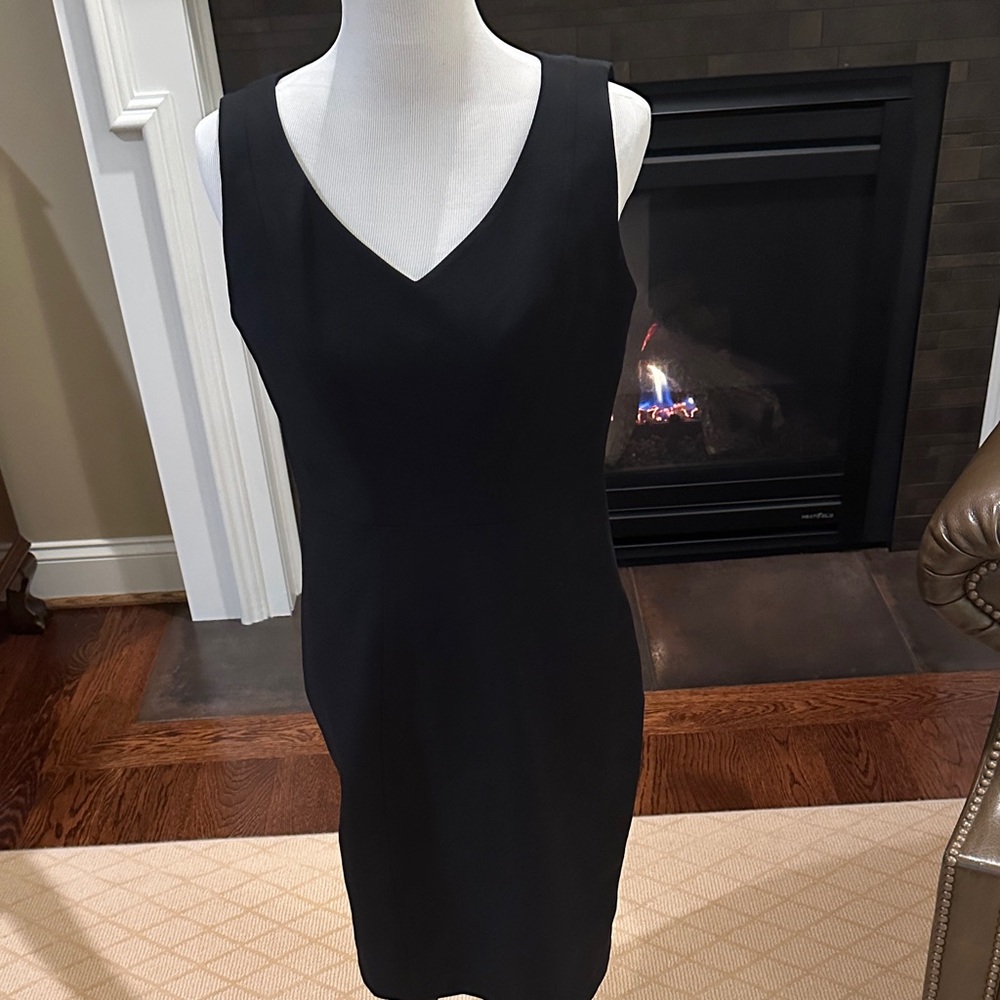 Classic black midi dress by Gravitas.Beautifully tailored w sewn in shapewear.
